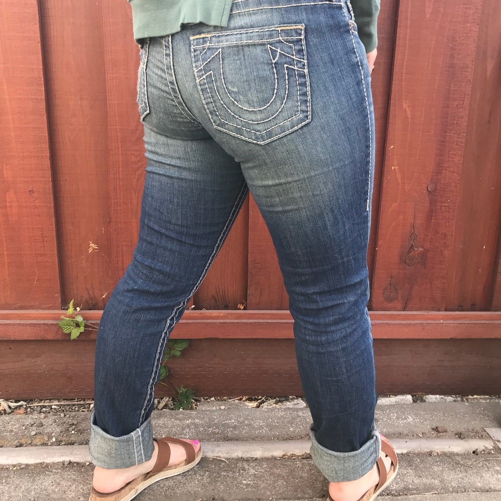 True Religion medium wash jeans .